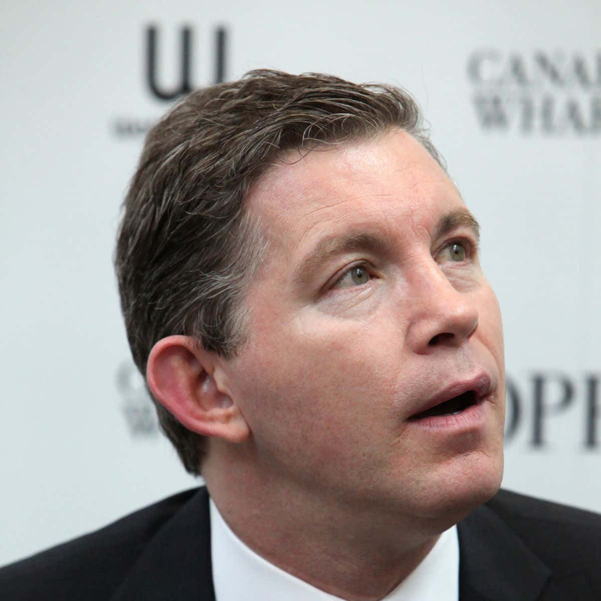 Comedian Lee Evans Performing Live On Stage Background