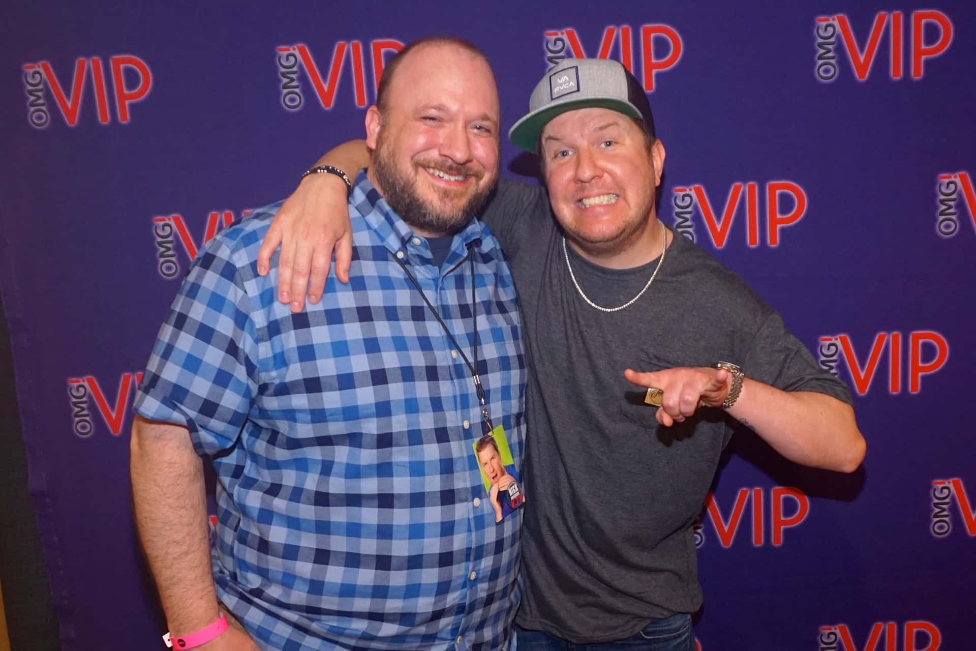 Comedian Nick Swardson Laughing On Stage Background