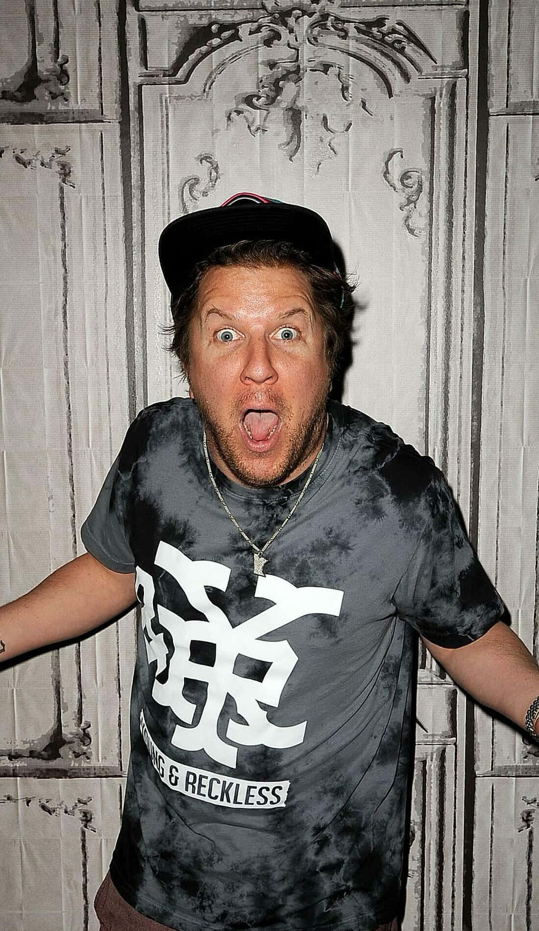 Comedian Nick Swardson Performing On Stage Background