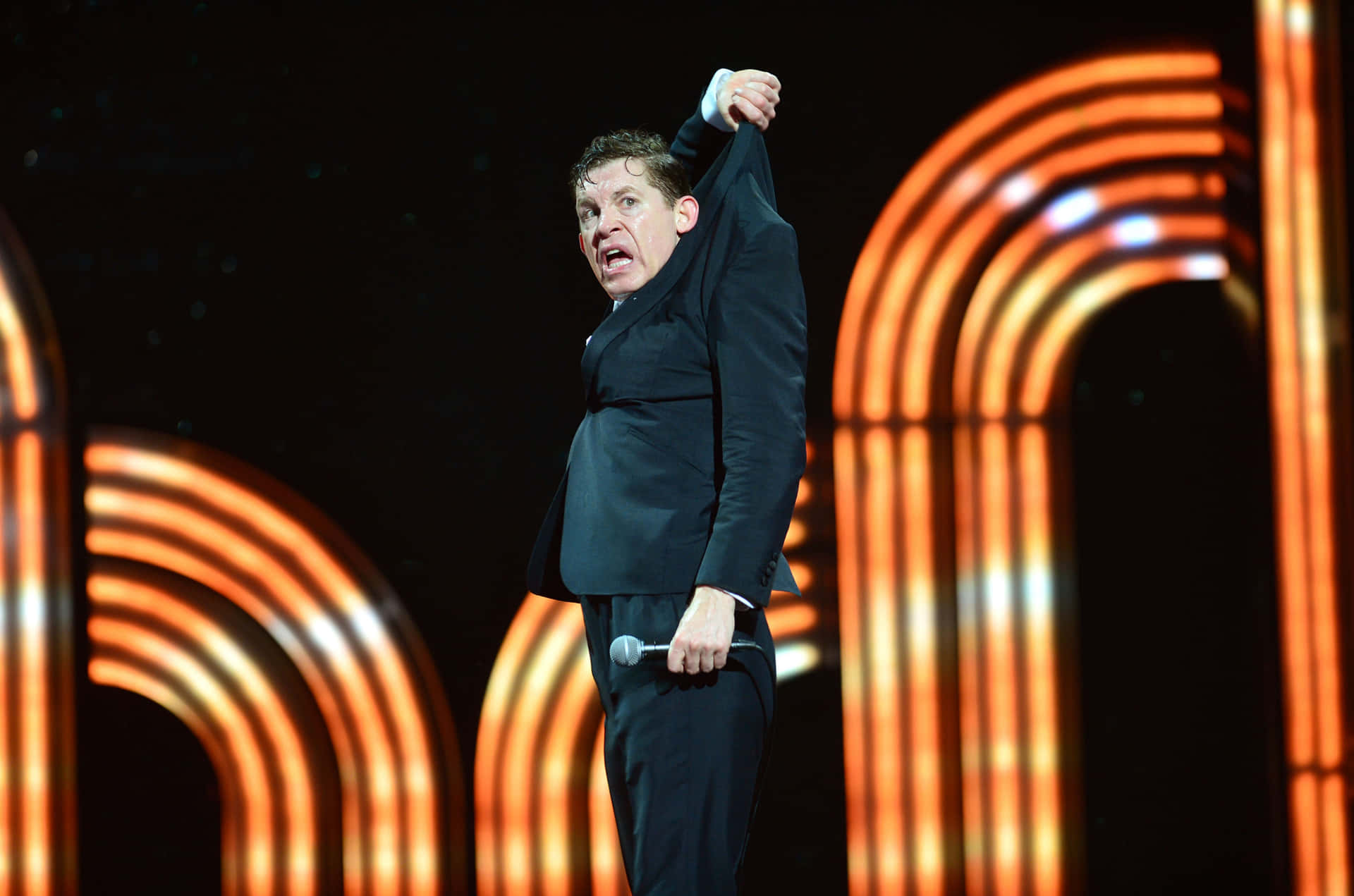 Comedian Performingon Stage Background