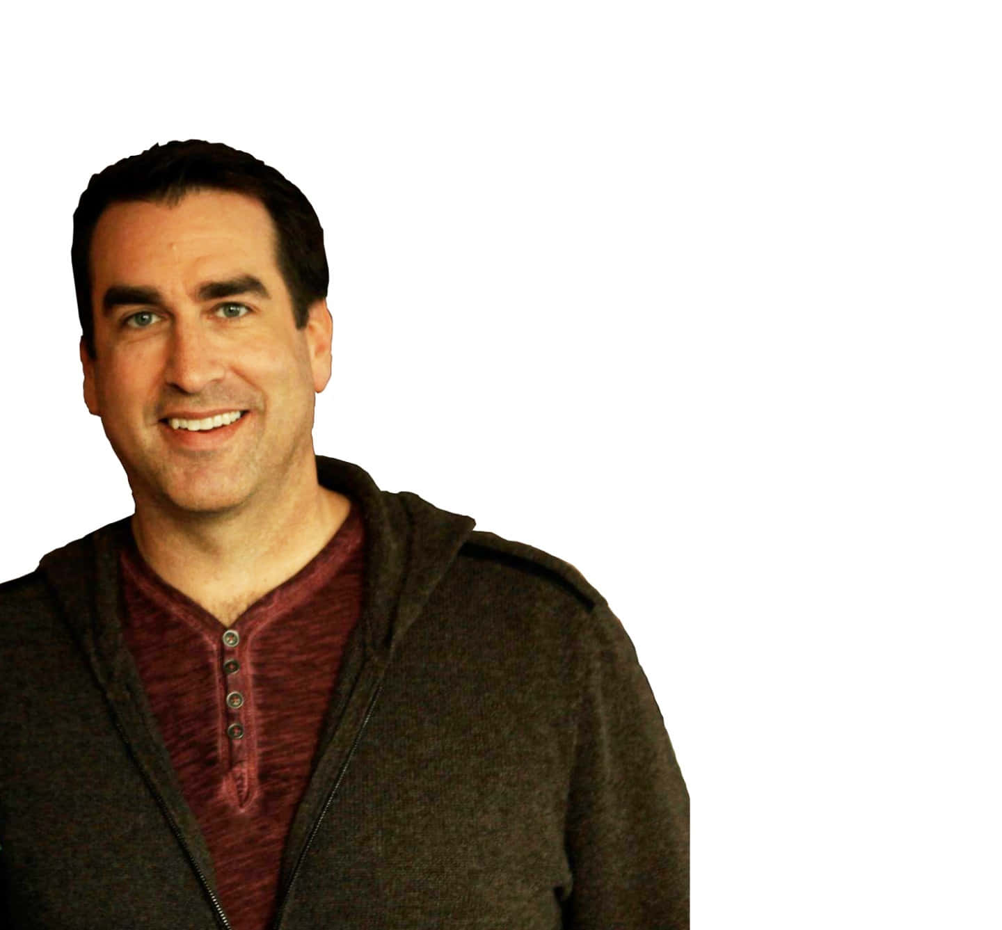 Comedian Rob Riggle On Stage. Background