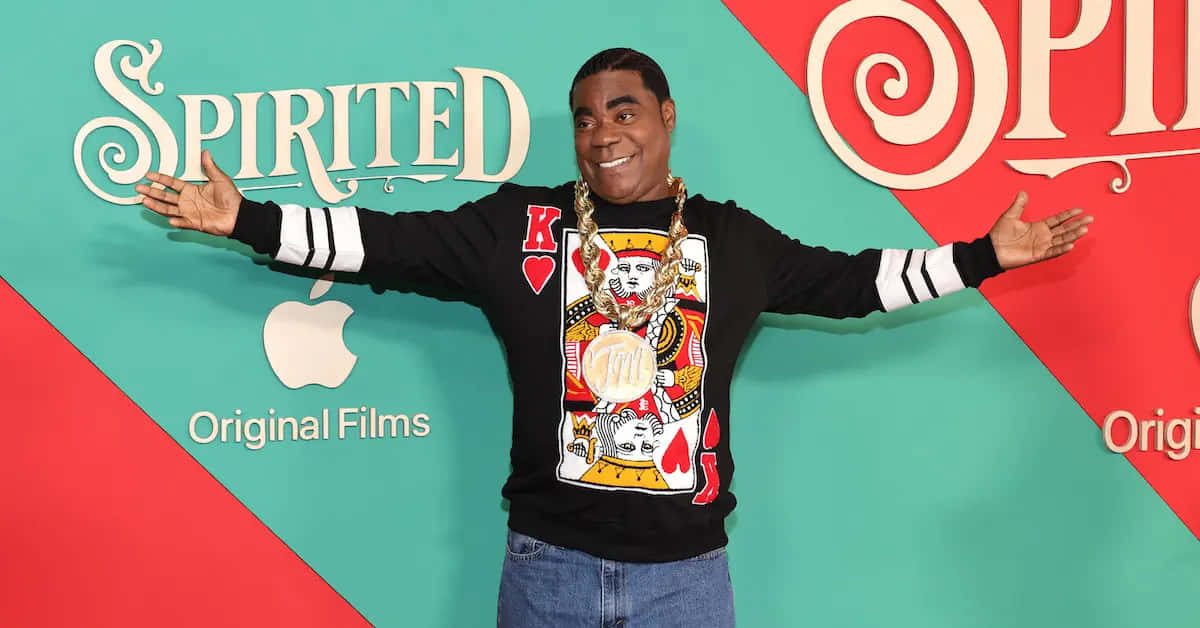Comedian Tracy Morgan Smiling In A Photoshoot Background