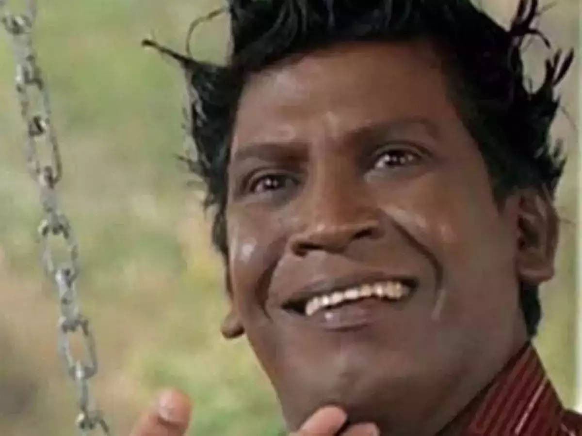 Comedian Vadivelu With Spikey Hairstyle Background