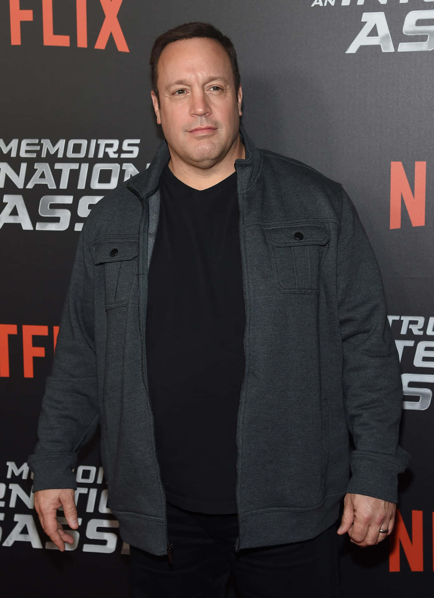 Comedic Genius Kevin James In A Moment Of Pause Background
