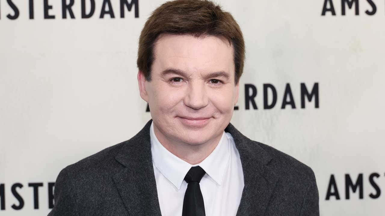 Comedic Icon Mike Myers Background