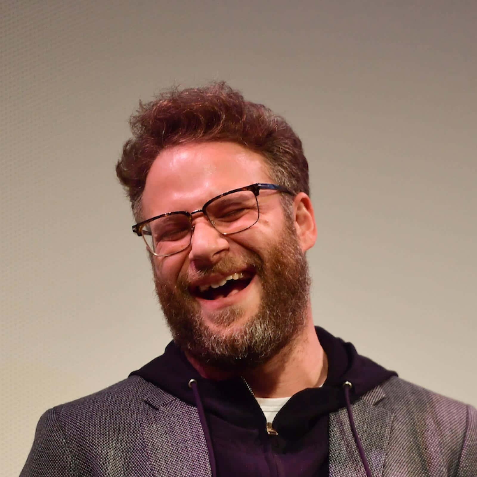 Comedic Powerhouse Seth Rogen Smiling Candidly Background