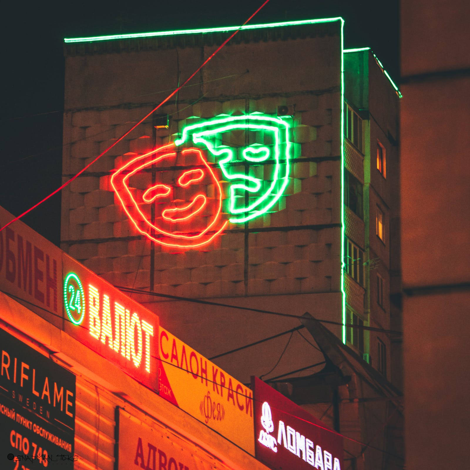 Comedy And Drama Faces Sign Neon Iphone Background