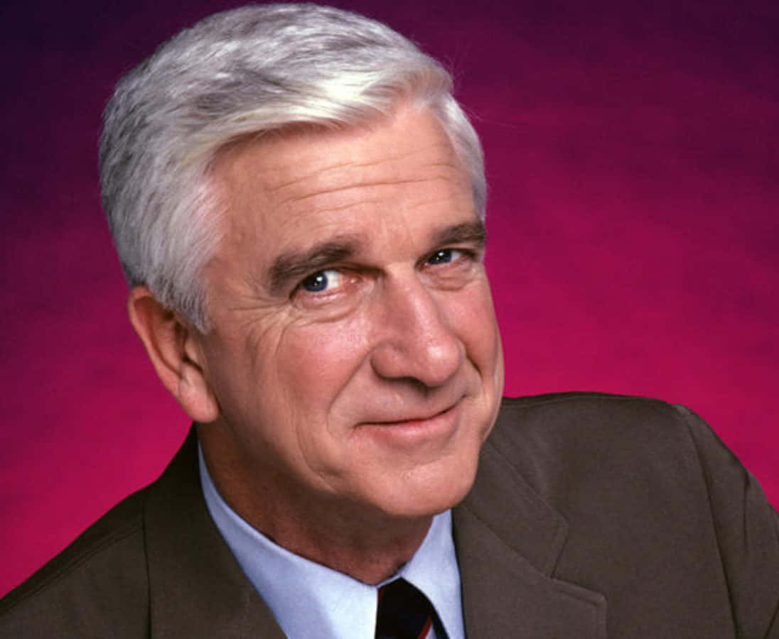 Comedy Legend Leslie Nielsen In One Of His Iconic Movie Roles. Background