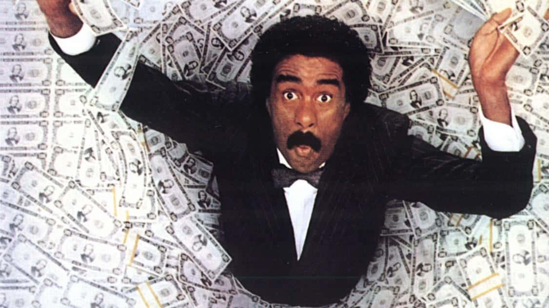 Comedy Legend Richard Pryor In Action Background