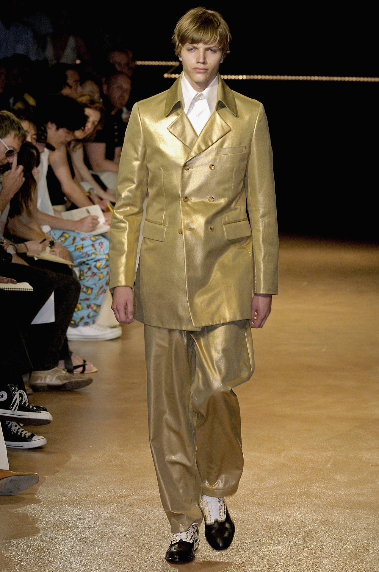 Comme Des Garçons Gold Suit Background