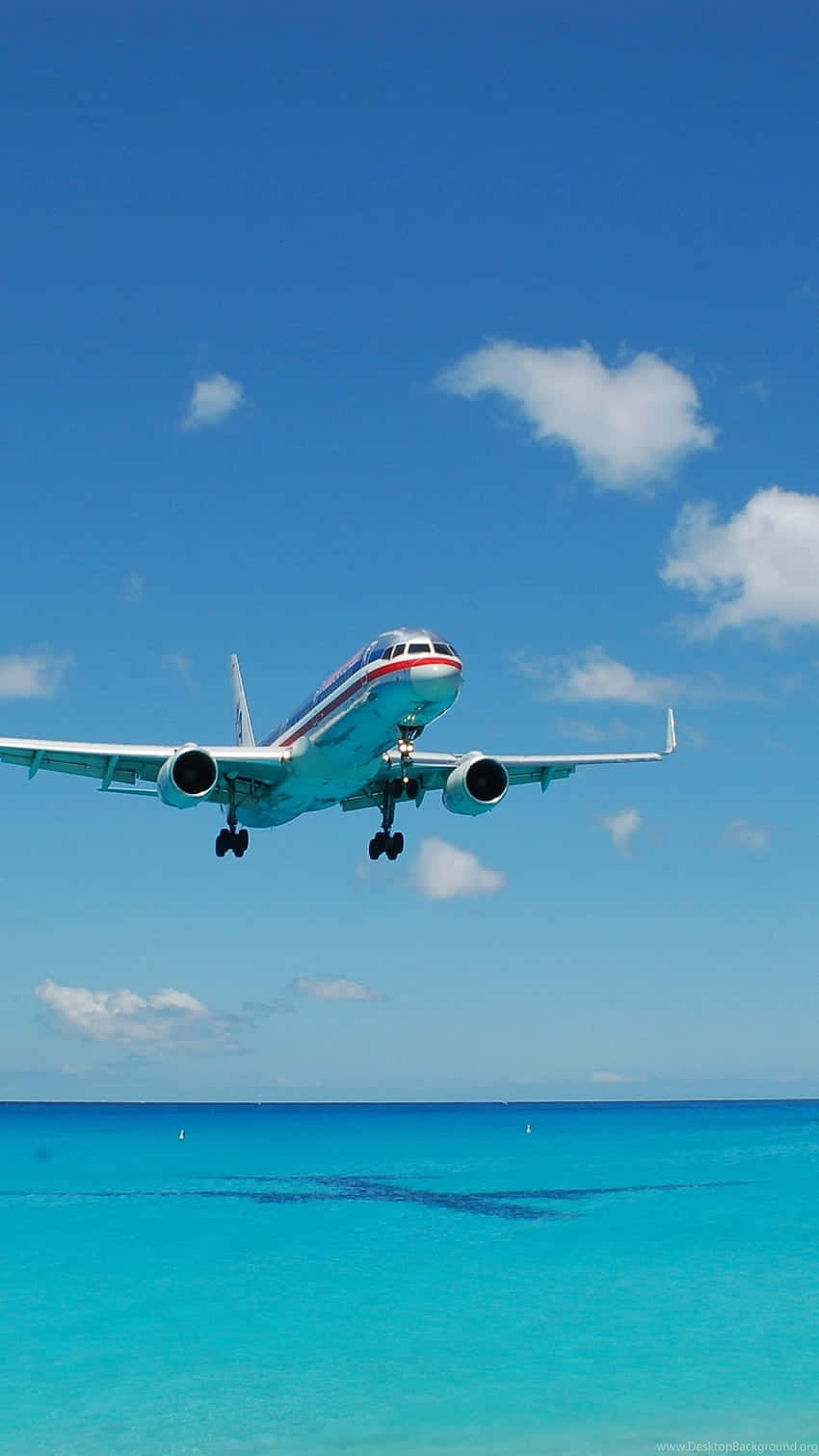 Commercial_ Airplane_ Landing_ Tropical_ Waters.jpg Background