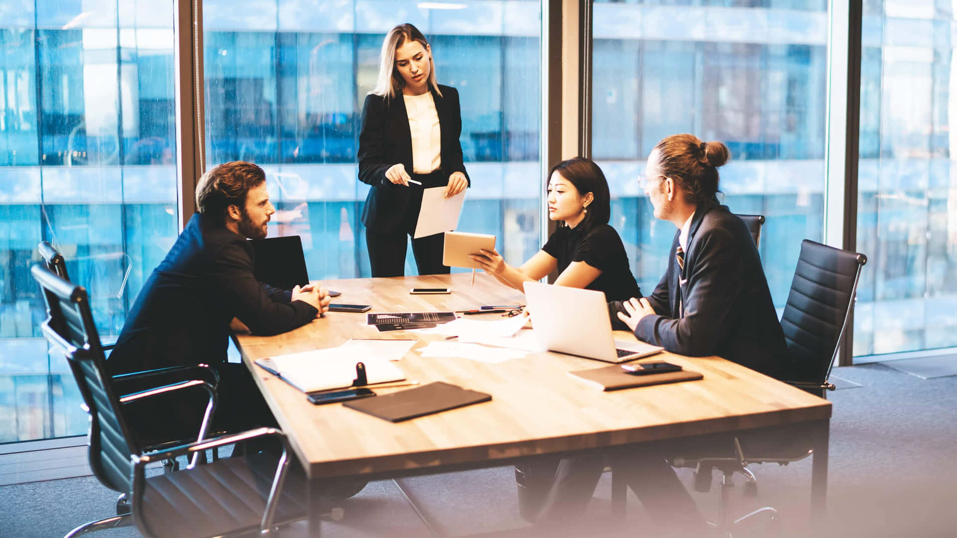 Commercial Team Discussing A Project Background