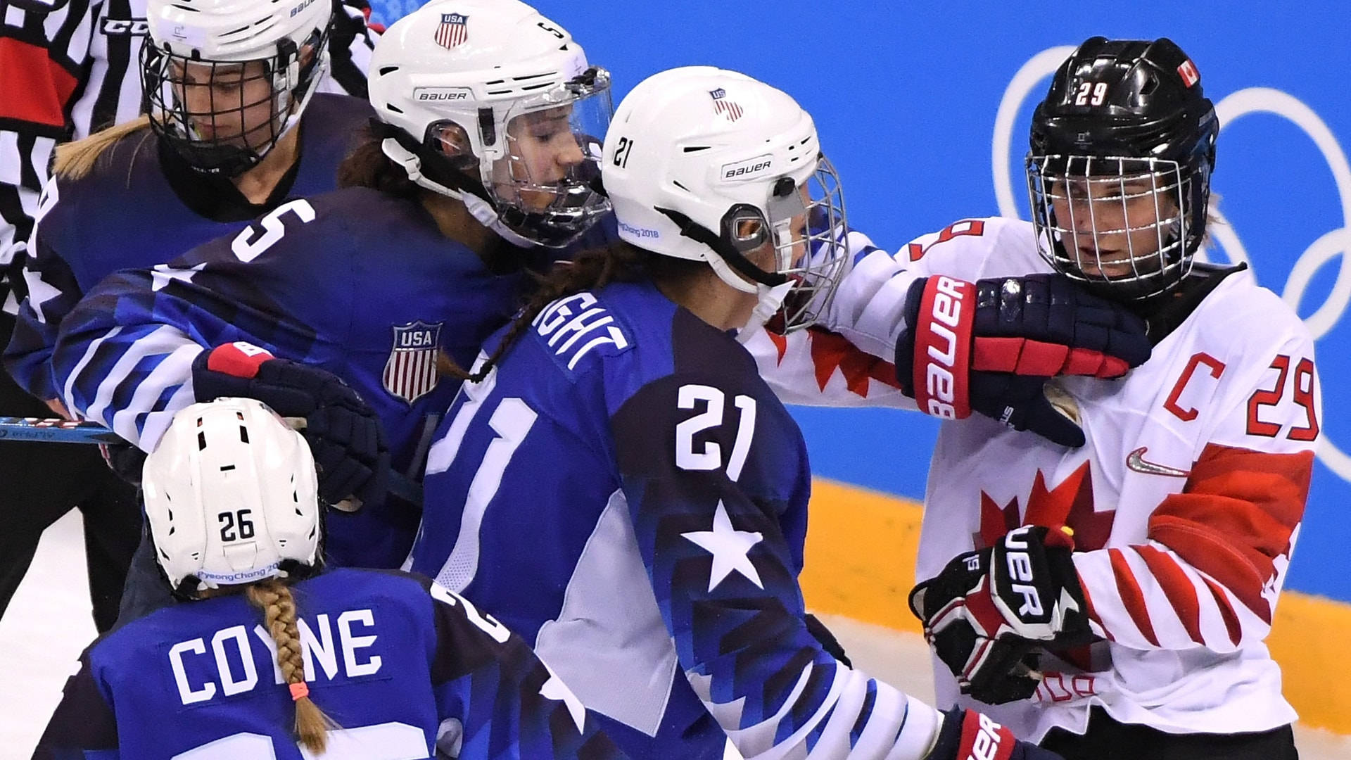 Competitive Edge - Hilary Knight In Face-off Against Canada Background