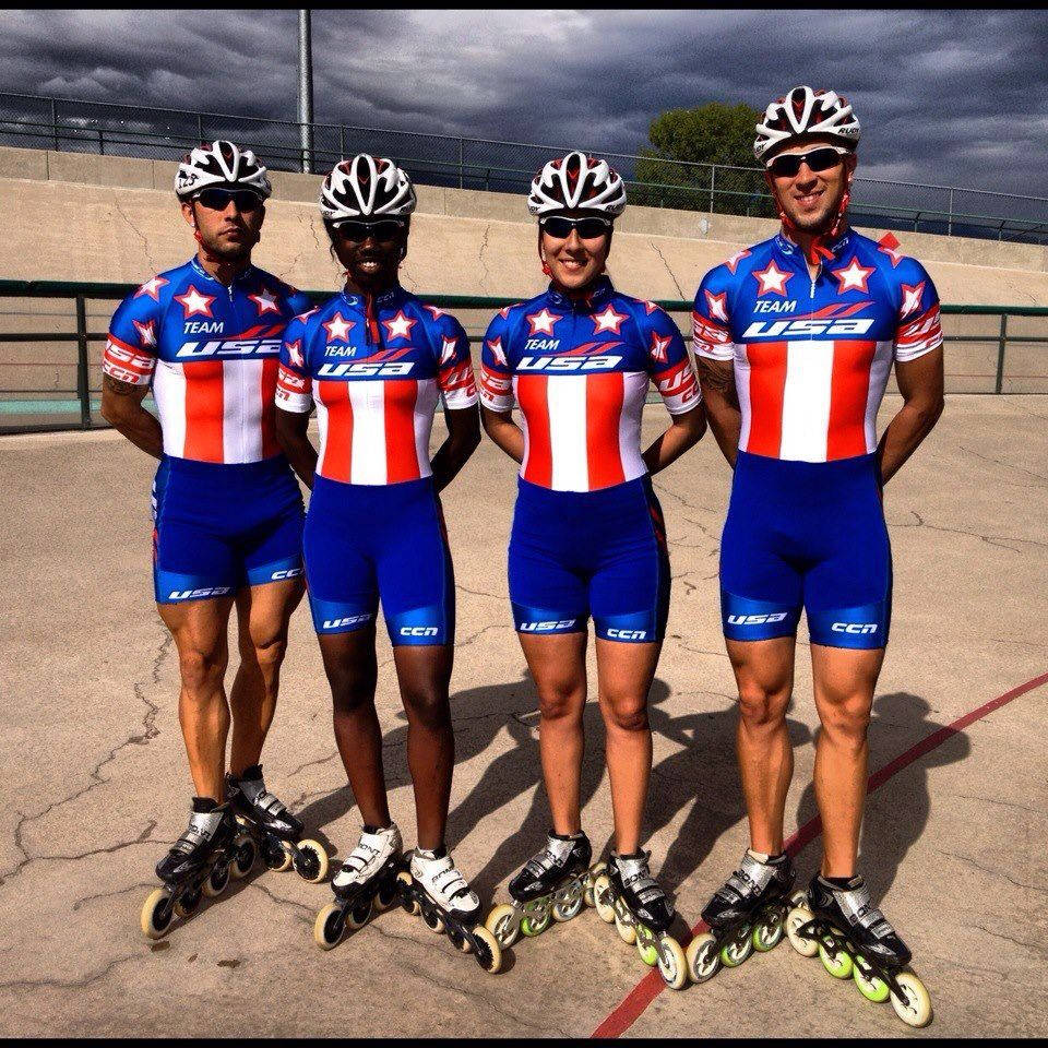 Competitive Inline Speed Skating Team In Action Background