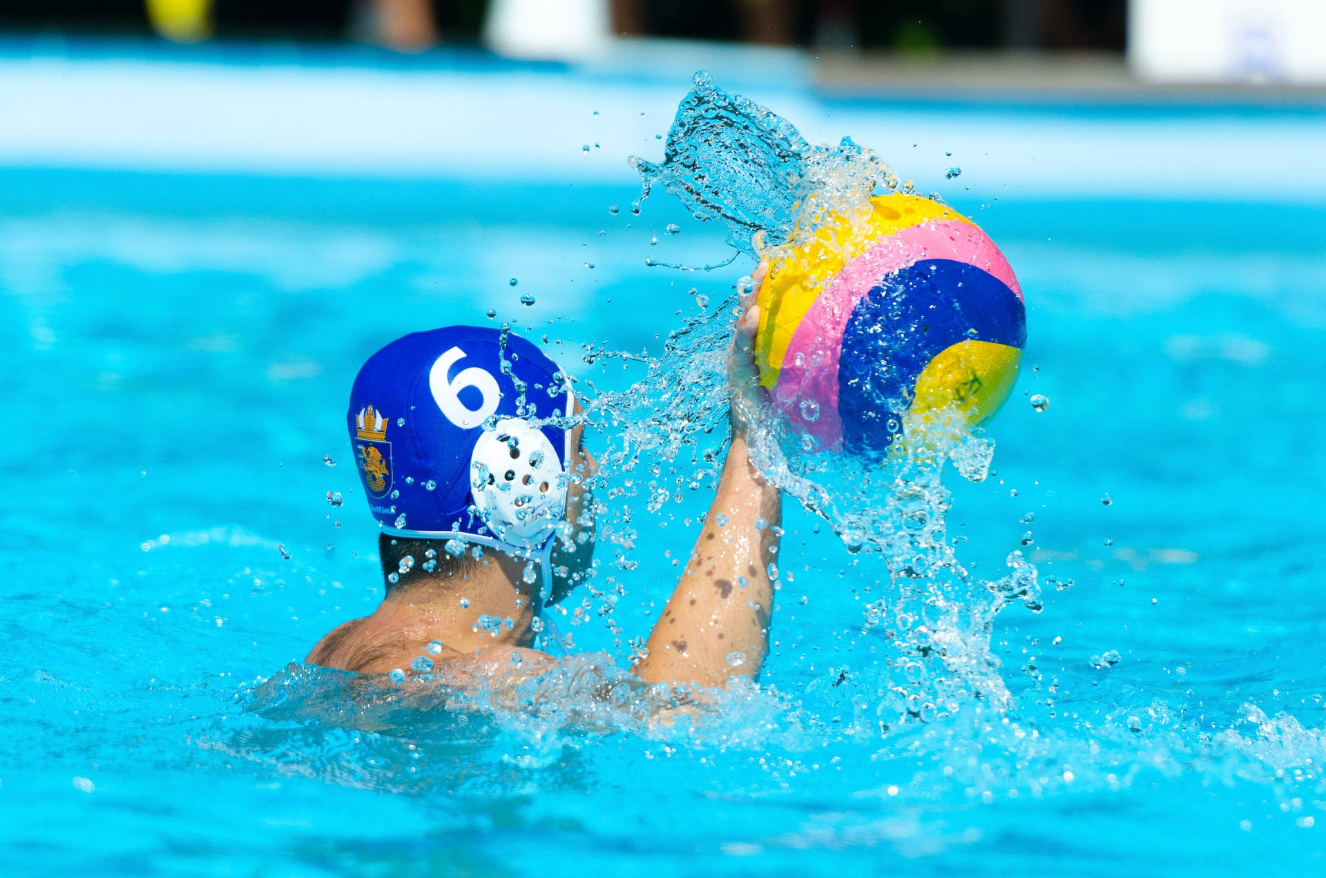 Competitive Underwater View Of A Water Polo Athlete In Action