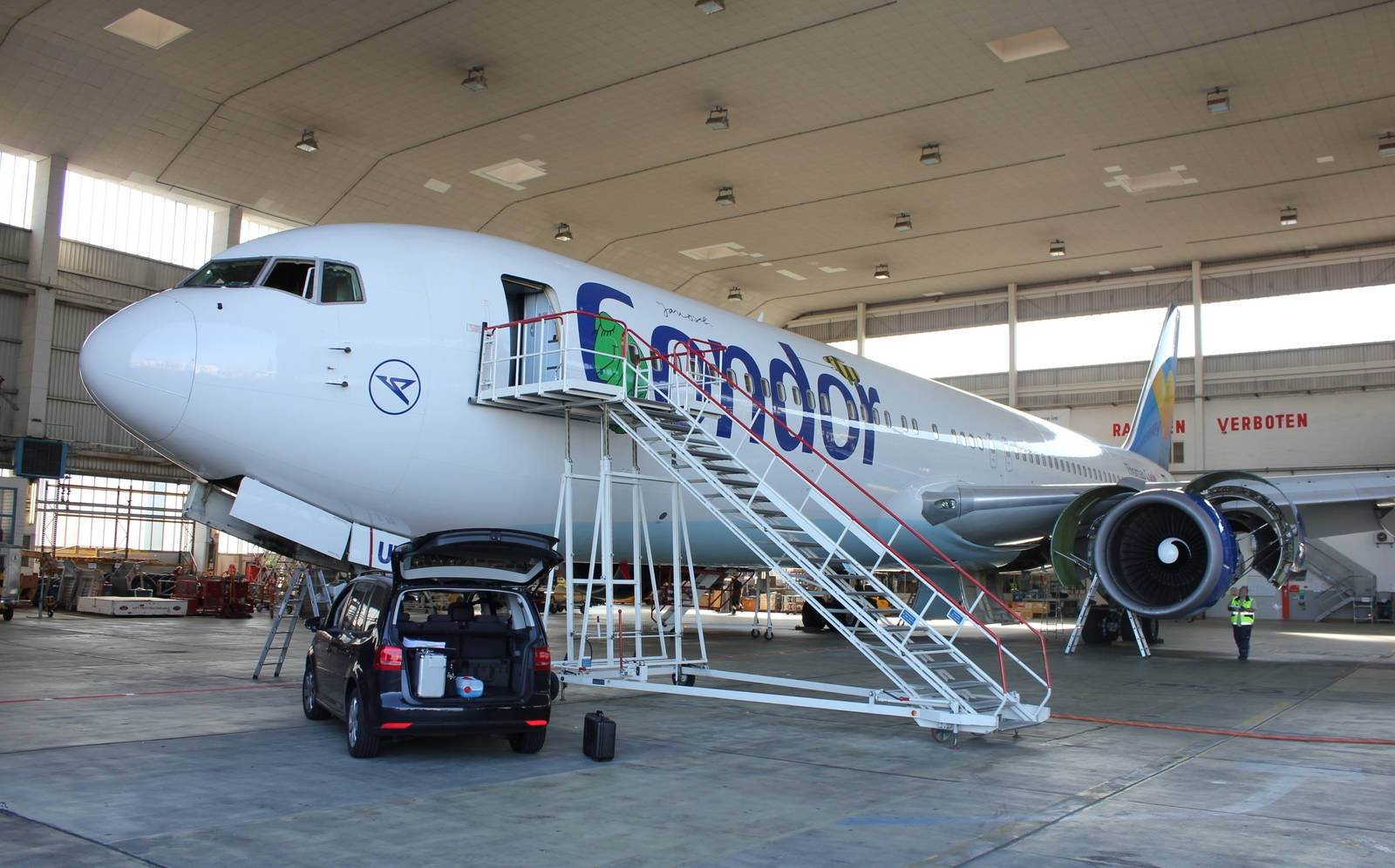 Condor Airlines Airbus In Airport Hangar Background