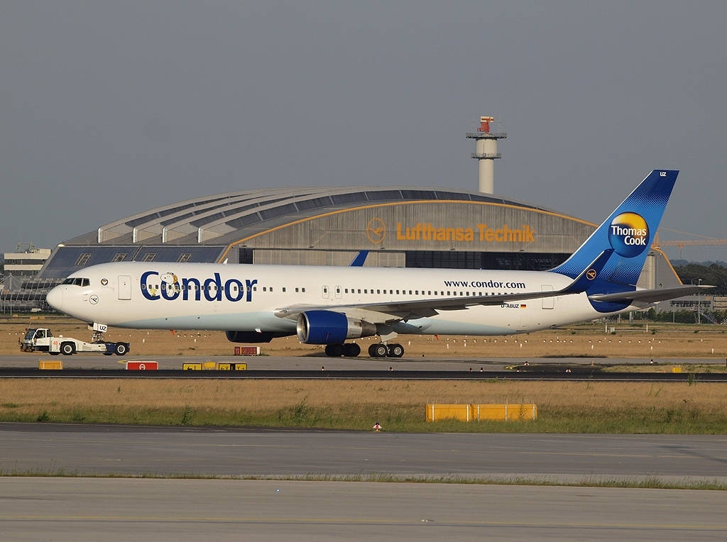 Condor Airlines Airplane Near Airport Terminal Background