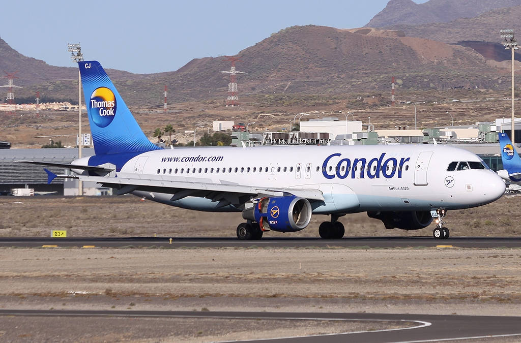 Condor Airlines Airplane On Rural Airport Background