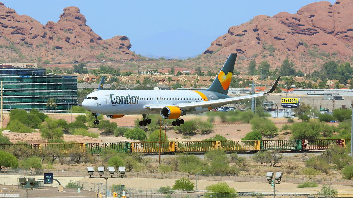 Condor Airlines Gliding Above Airport Background