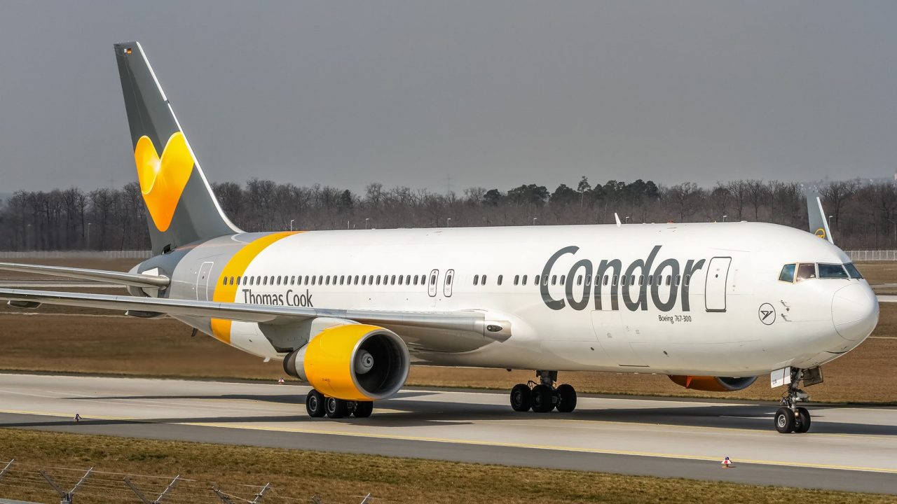 Condor Airlines Yellow And Grey Airplane Background