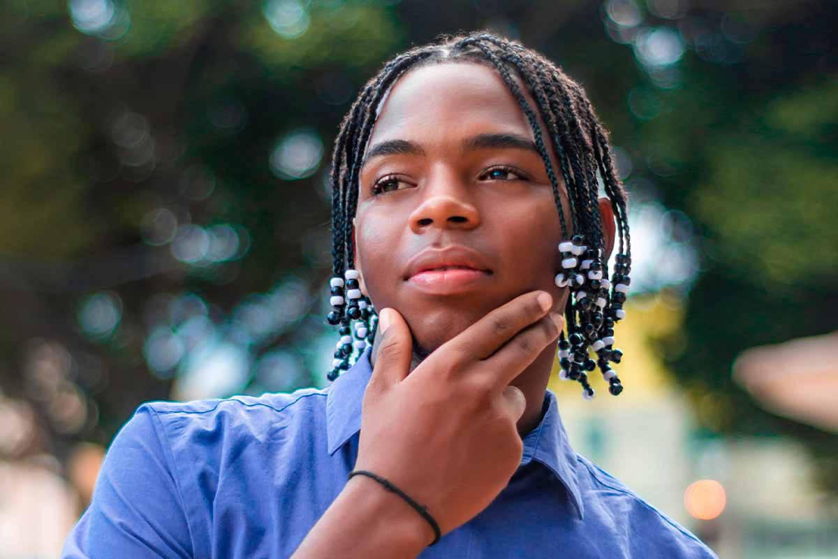 Confident And Handsome Black Man Flaunting His Dreadlocks