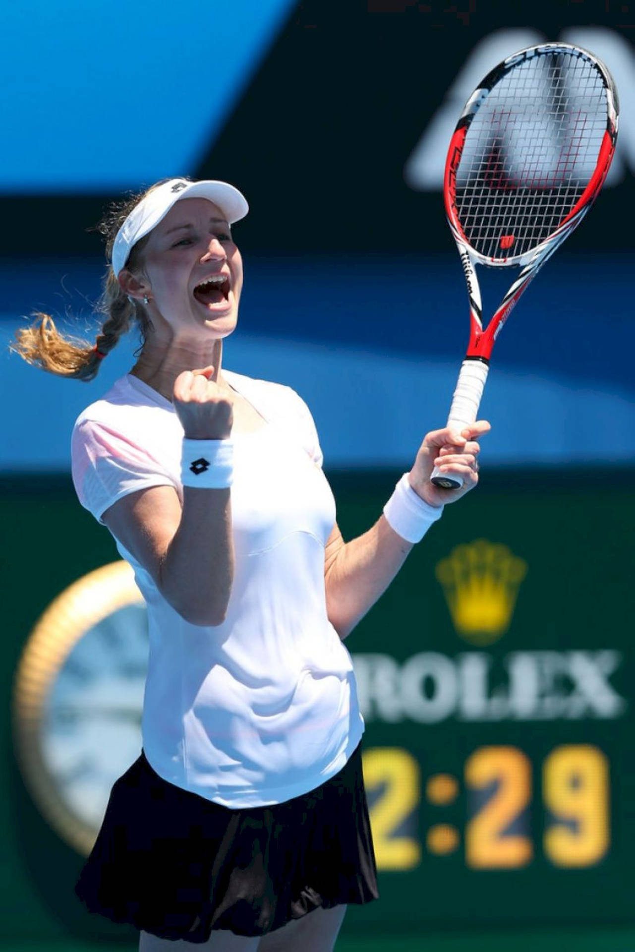 Confident Ekaterina Makarova Celebrating With A Fist Pump During Match