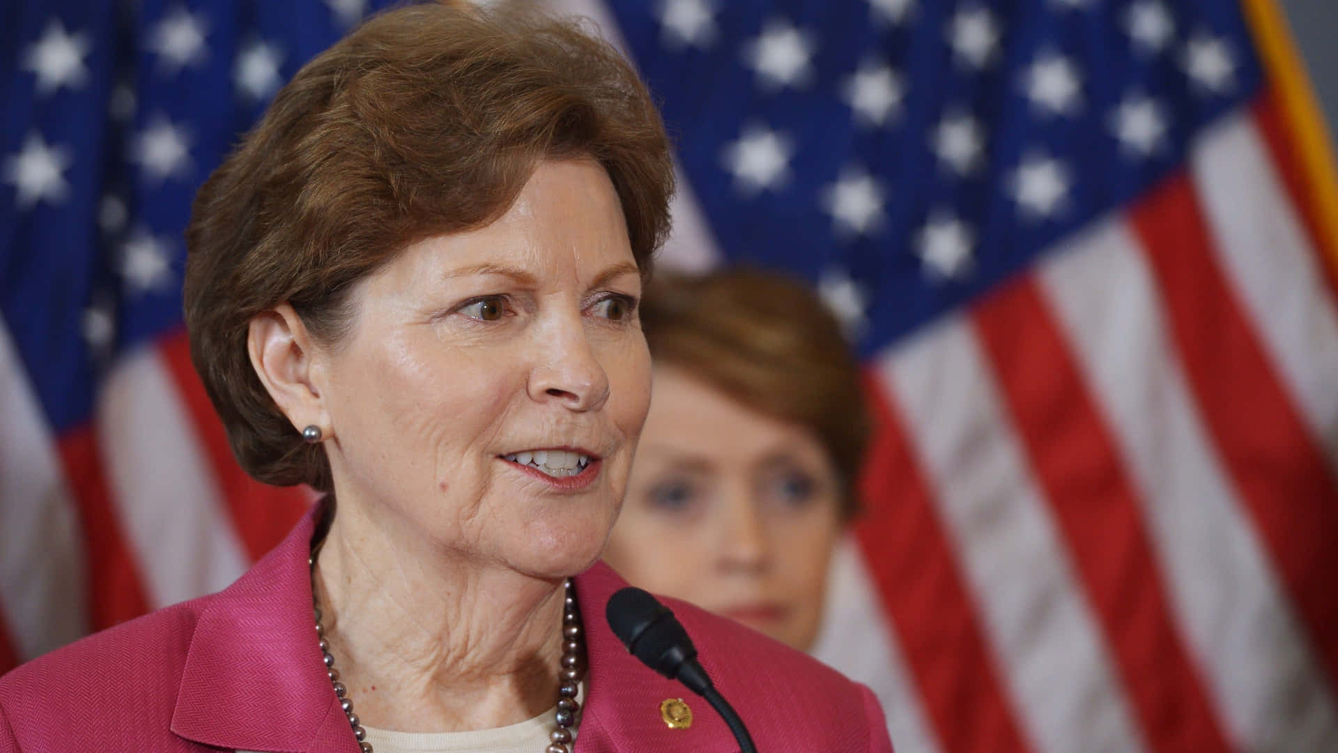 Confident Jeanne Shaheen Background