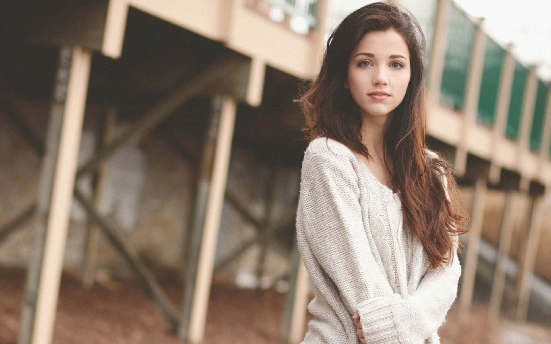 Confident Teenage Girl In Comfortable Sweater Background