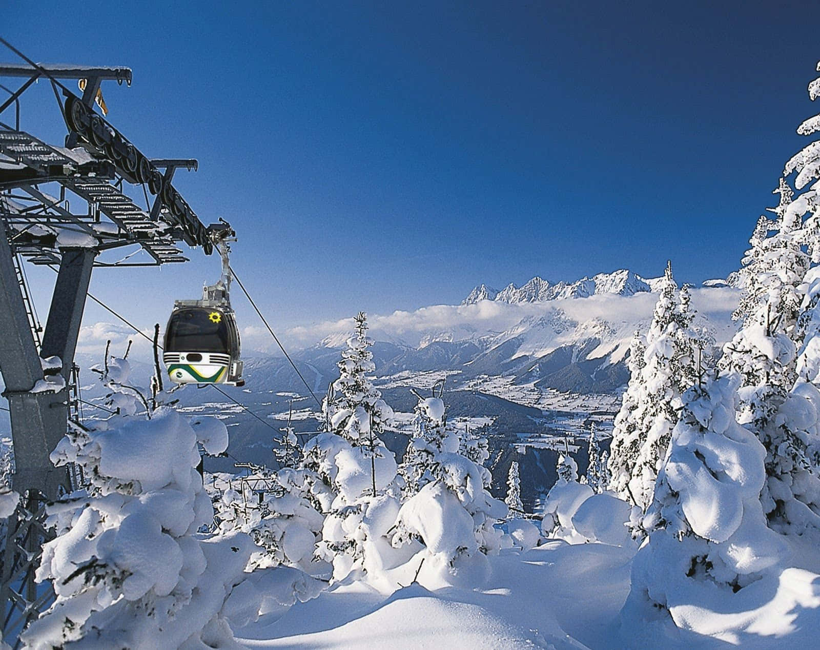 Conquer The Slopes And Embrace The Stunning Beauty Of The Ski Mountain Background