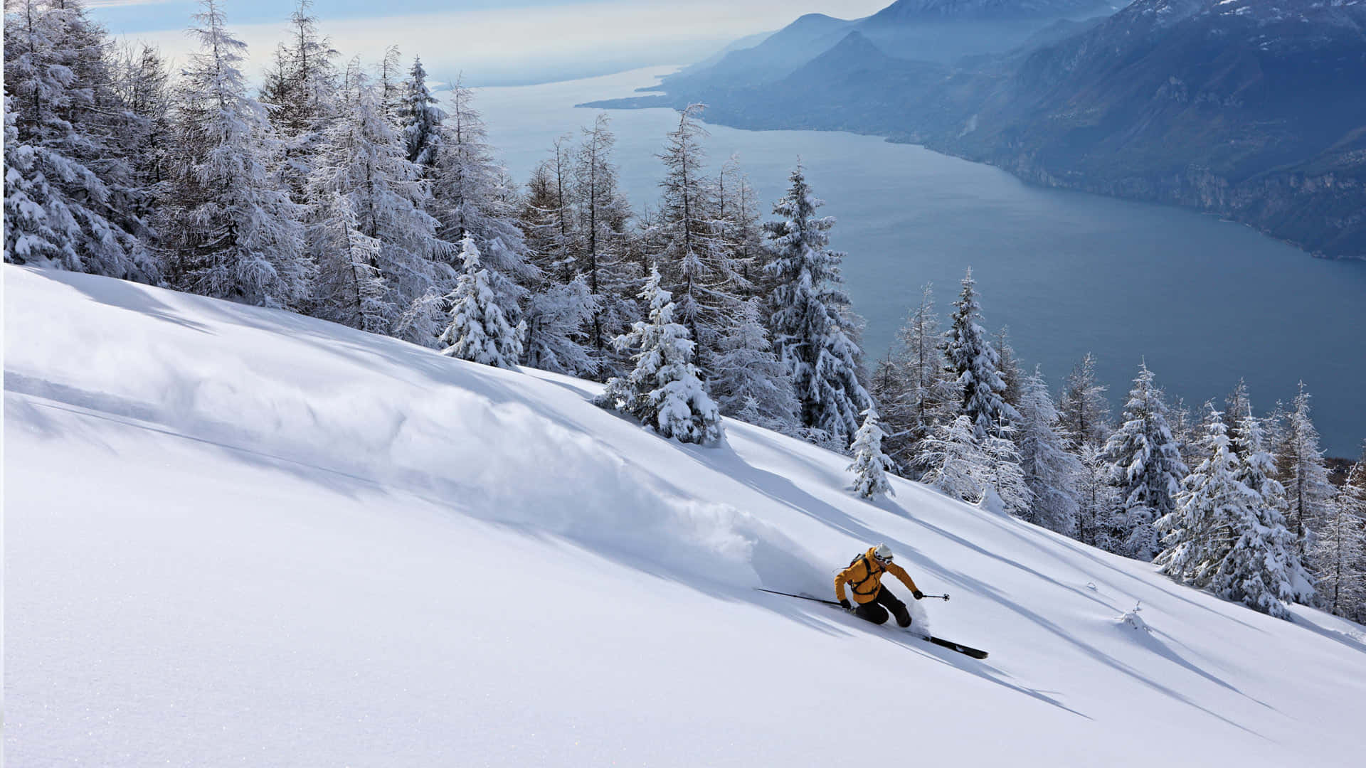 Conquer The Winter With Snow-capped Mountains And Ski Trails. Background