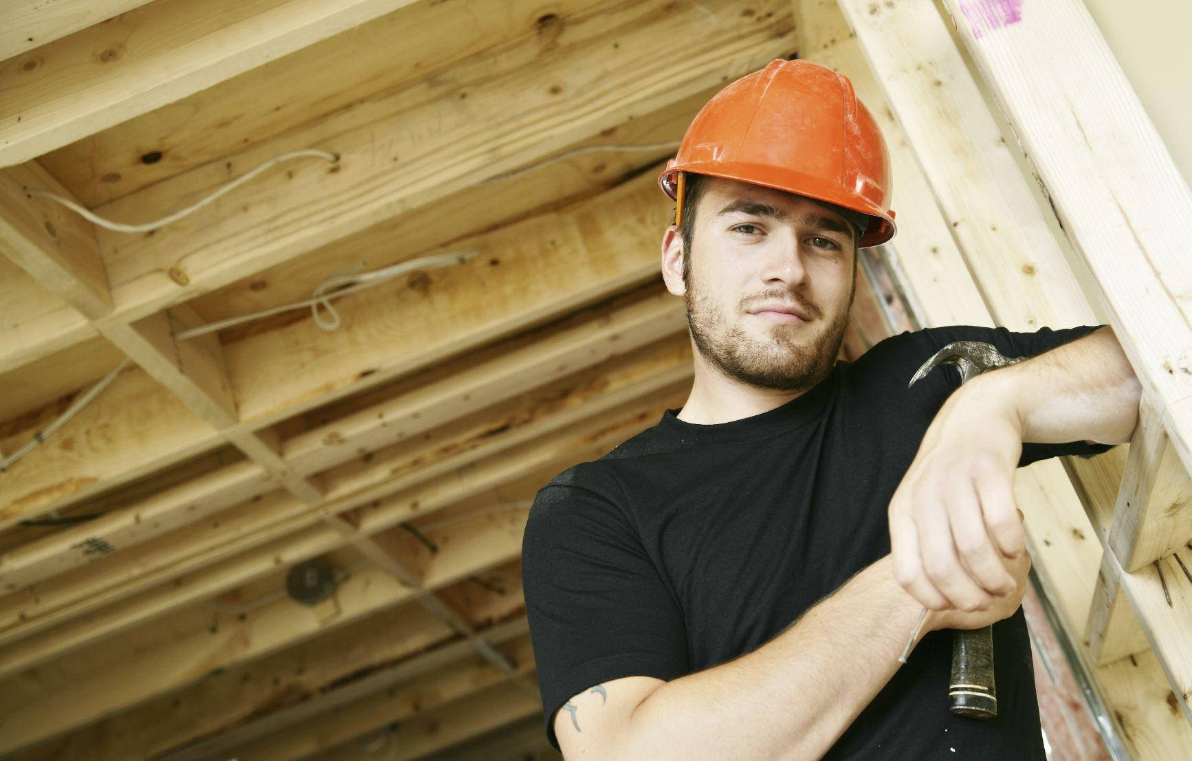 Construction Worker Smiling At Tthe Camera Background