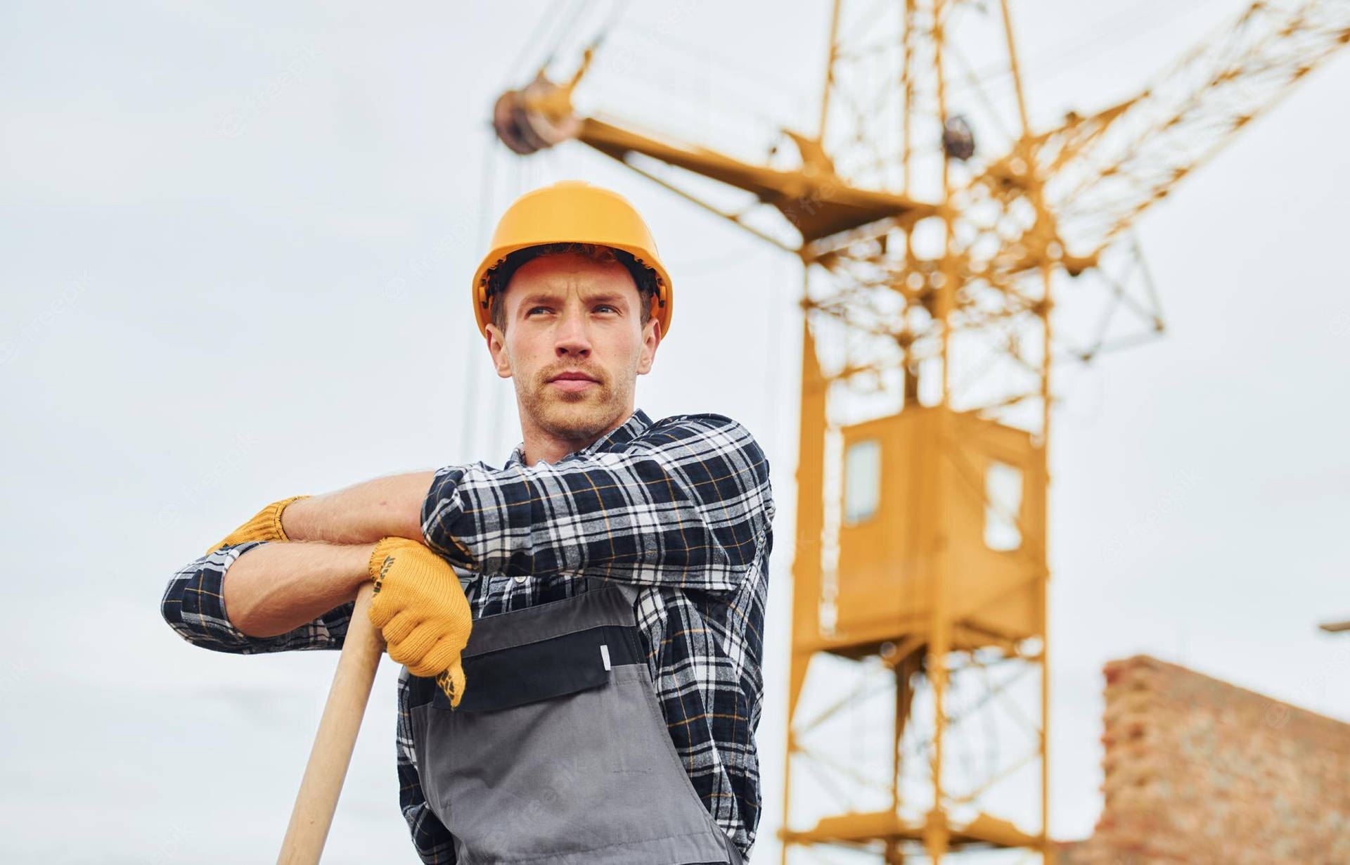 Construction Worker Wearing A Checkerd Longsleeve