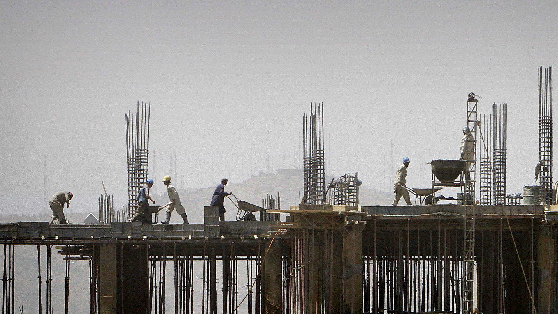 Construction Workers At Work