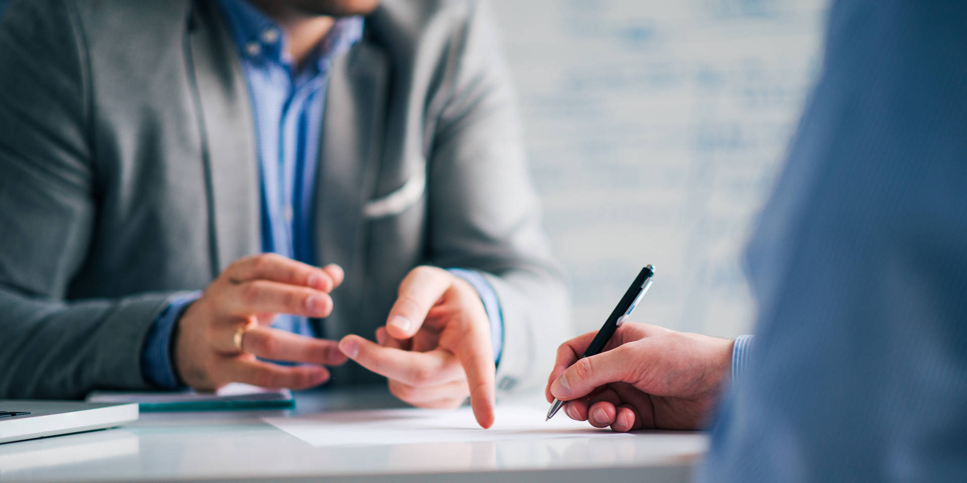 Consultant Taking Down Notes Background