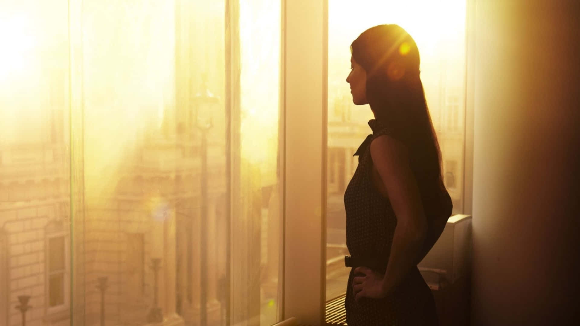 Contemplative Woman Sunset Silhouette
