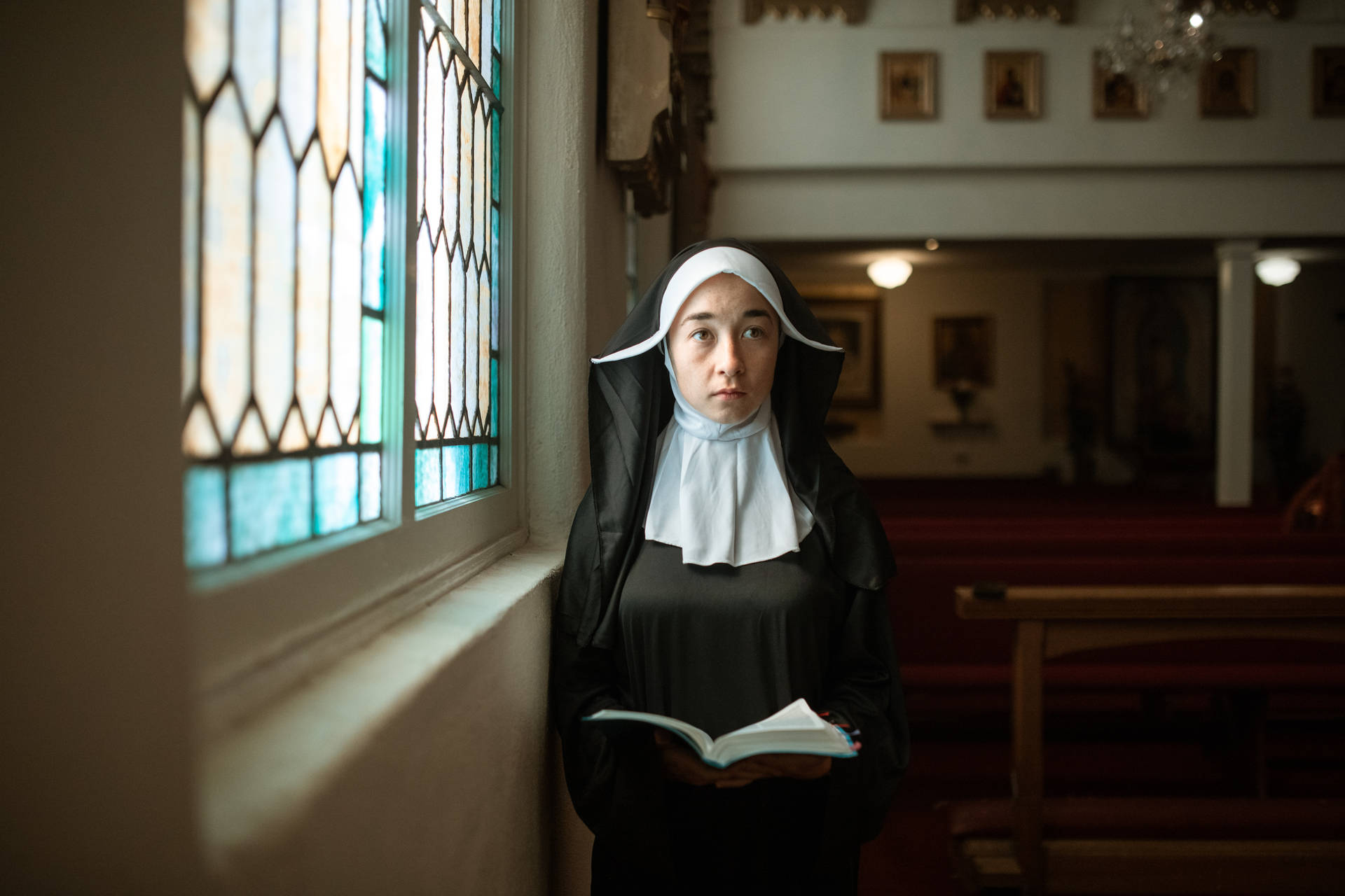 Convent Nun With Bible