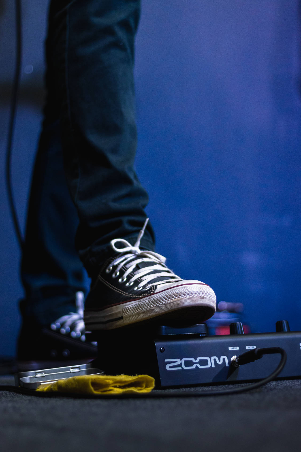 Converse Sneakers On Amplifier Background
