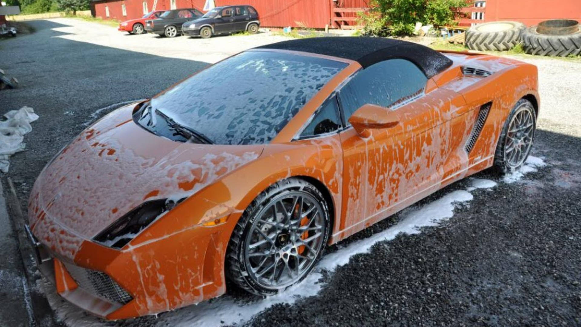 Convertible Orange Ferrari Car Wash Background