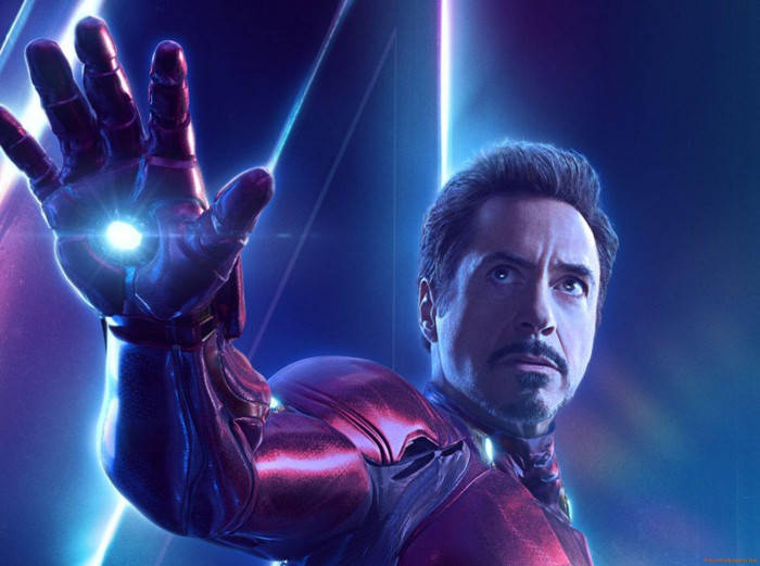 Cool Avengers Poster Featuring Iron Man Background