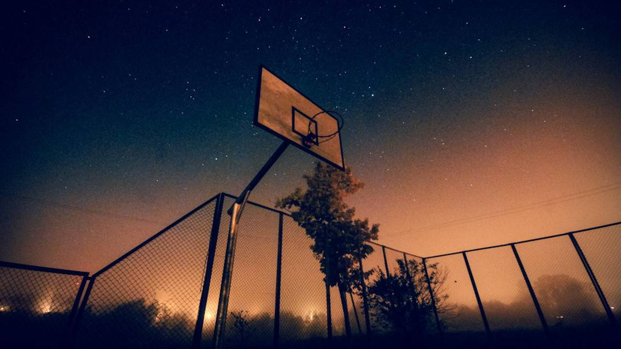 Cool Basketball At Dusk Background