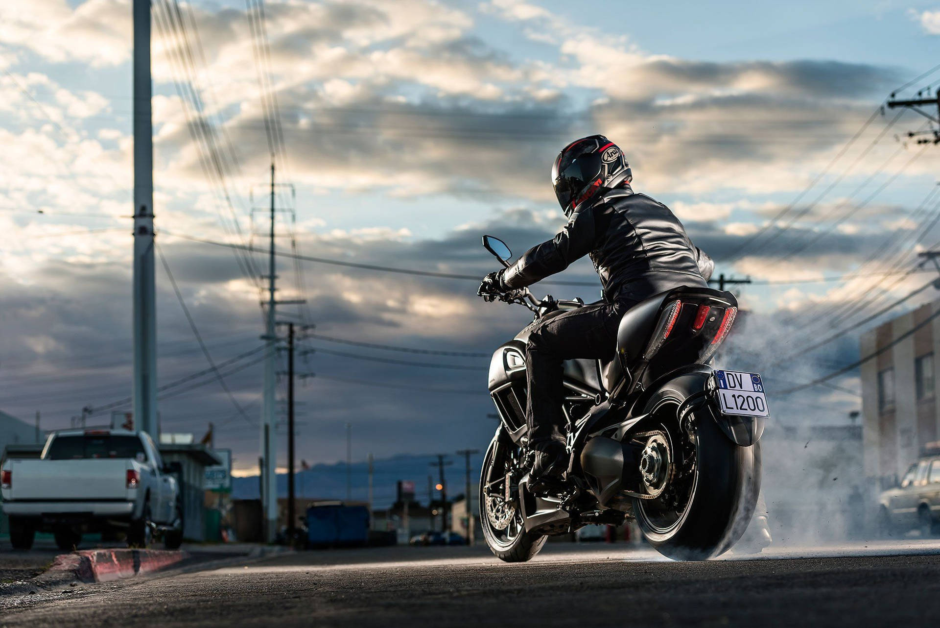 Cool Bike Rider On An Empty Street Background