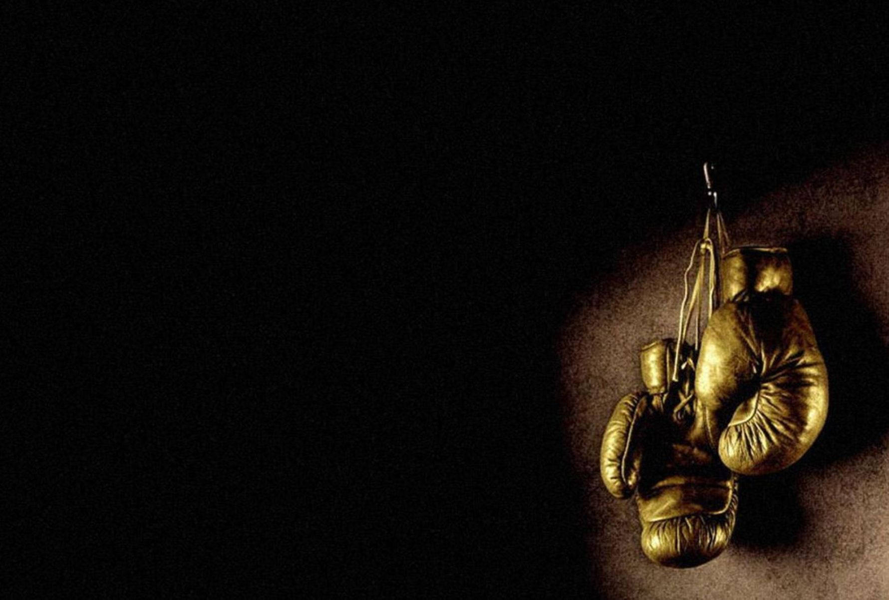 Cool Boxing Gloves Hanging On Wall Background