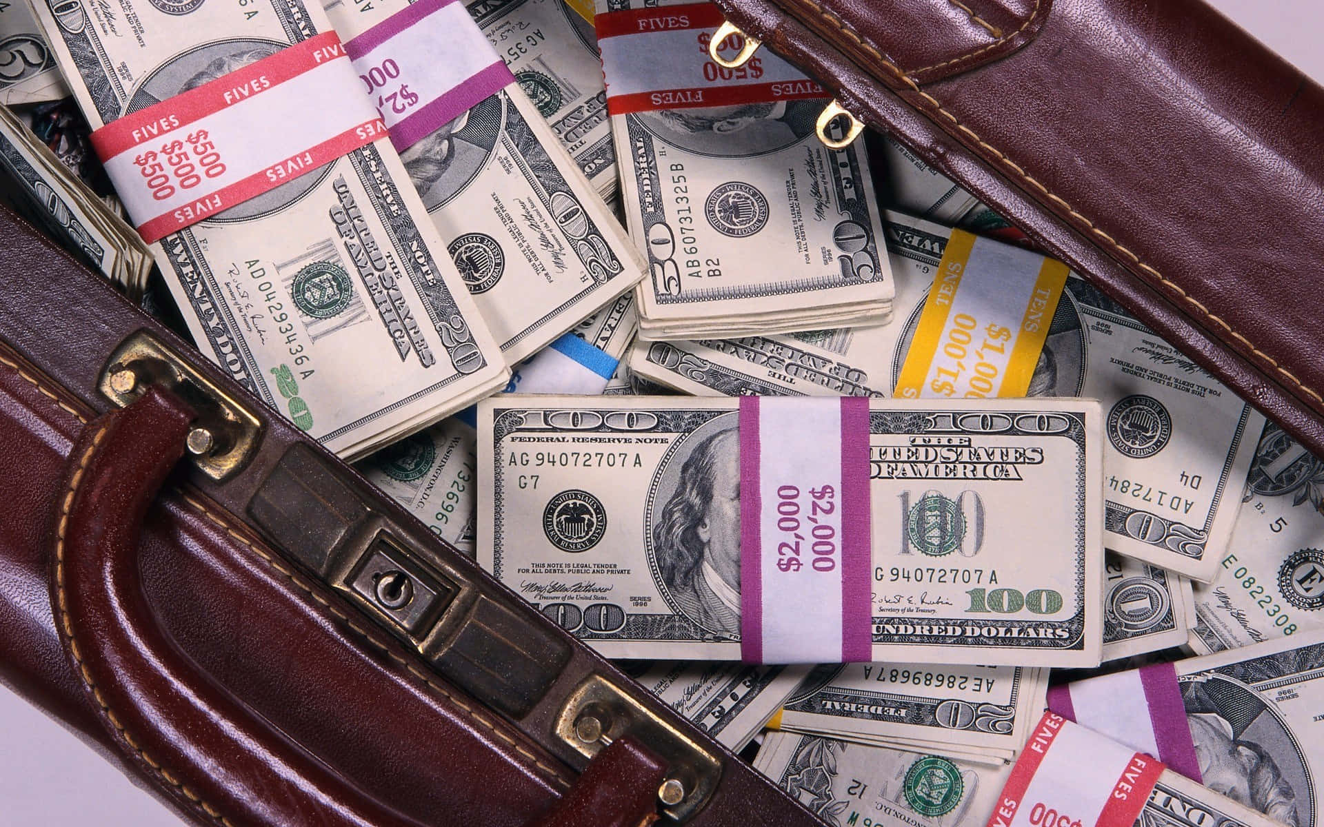 Cool Briefcase With Money Background