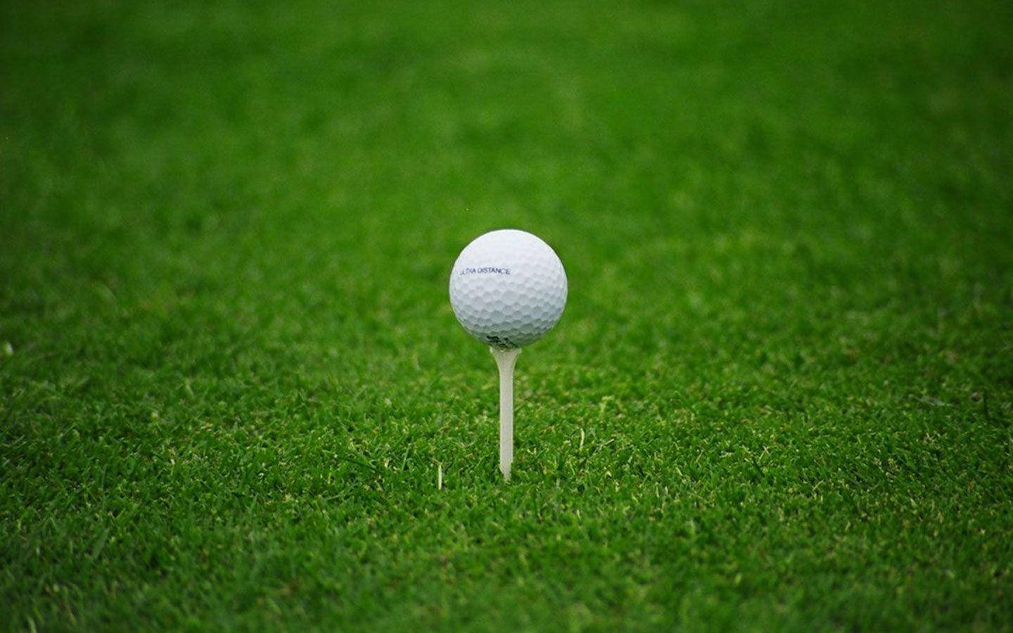 Cool Golf Ball On Tee Background