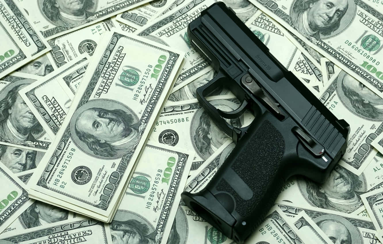 Cool Gun On Money Background