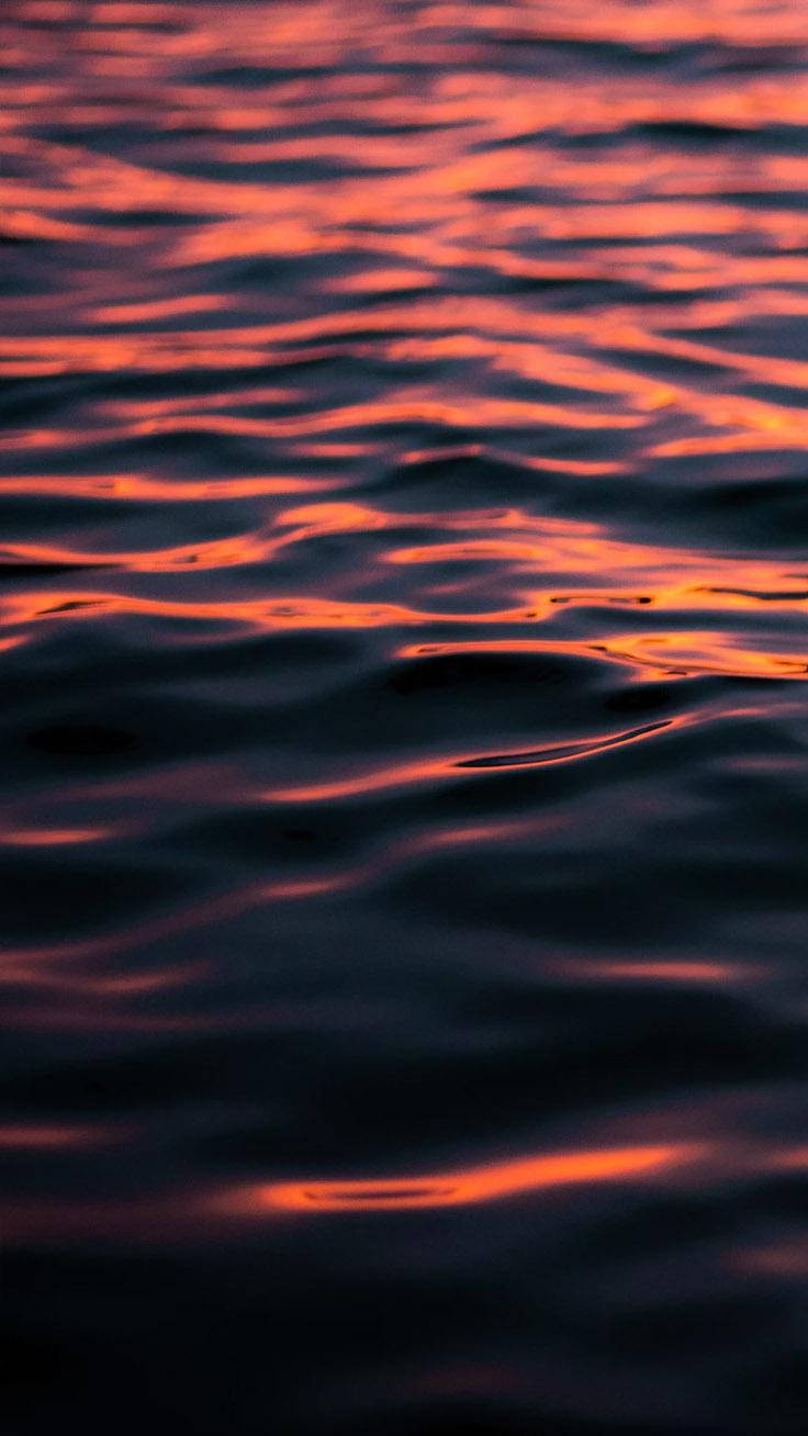Cool Iphone Xs Max Orange Ocean Surface Background