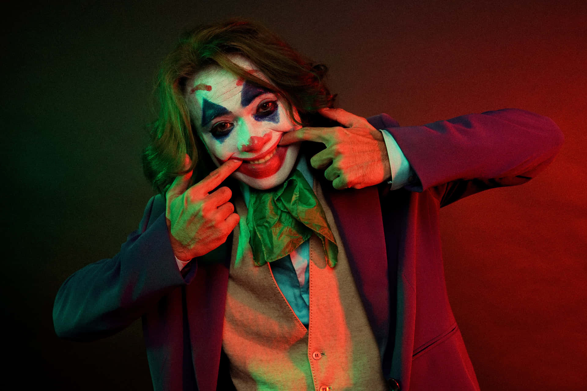 Cool Joker Under Dramatic Lighting Background