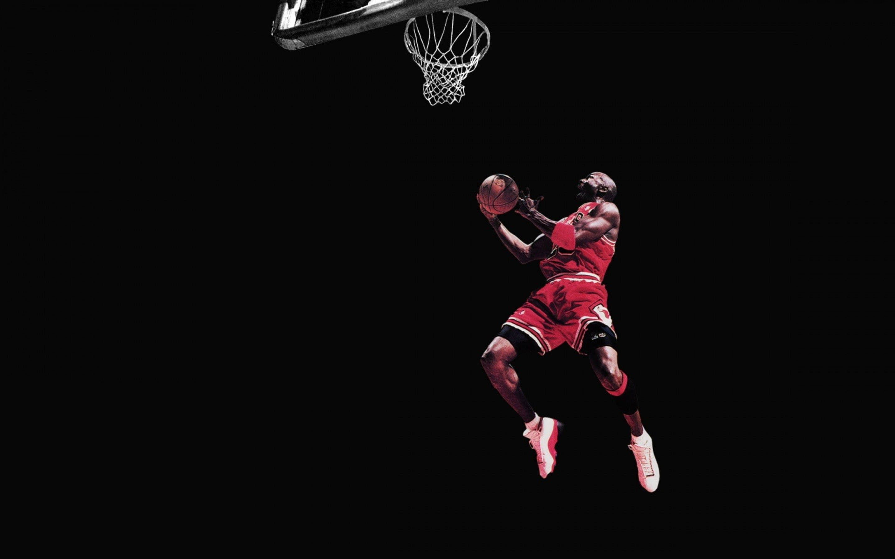 Cool Jordan In Mid-air Moment Background