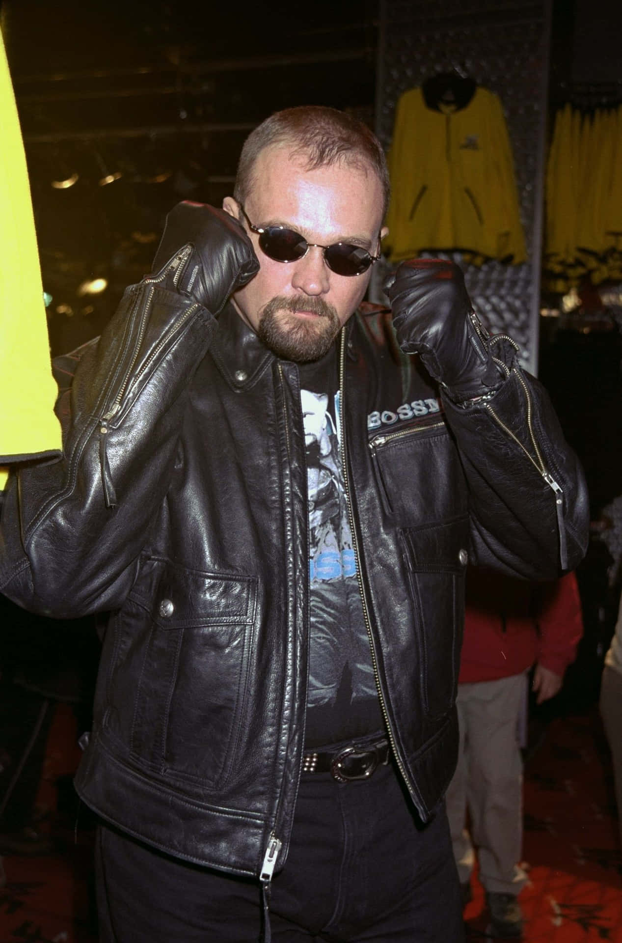 Cool Leather Jacket Man Adjusting Sunglasses