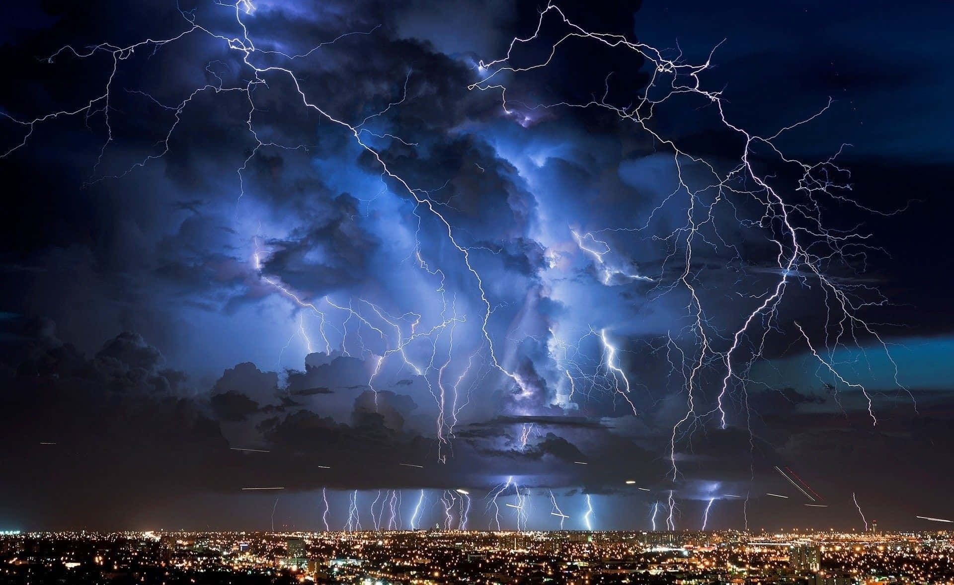 Cool Lightning Over City View Background